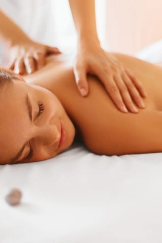 Woman Enjoying Relaxing Back Massage — All Over Beauty & Medi Span In Forresters Beach, NSW